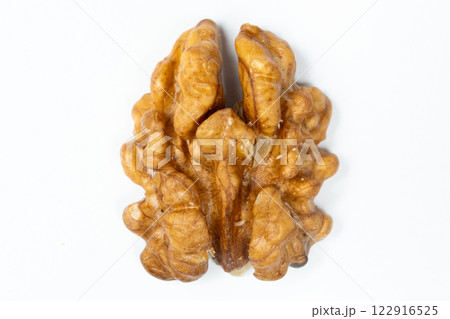 Macro peeled walnut, kernel, white isolate background, top view. 122916525