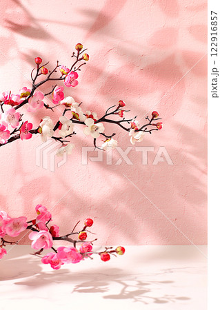 Beautiful spring flower arrangement with cherry blossom branches, elegant beauty concept, stage for product and business concept display. Minimal modern aesthetic, Premium empty podium 122916857
