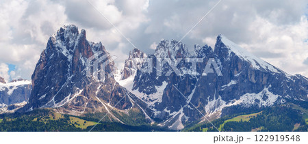Majestic mountain range panorama with snow-capped peaks near Valley of Funes at Dolomites, Italy 122919548