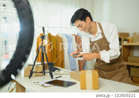 Small business owner using a smartphone to taking product photos for an online store Small business owner using a smartphone to taking product photos for an online store 122920211