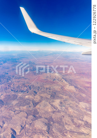 Aerial view on arabian desert and Red sea mountains from airplane 122926778