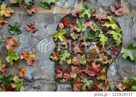 Ai generated Human head made of green autumn leaves 122929337
