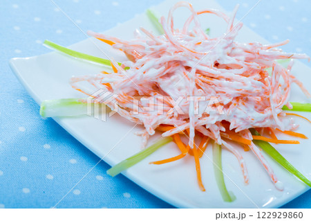 Close up of vegetable dish, salad with carrots, garlic and greek yogurt Close up of vegetable dish, salad with carrots, garlic and greek yogurt 122929860