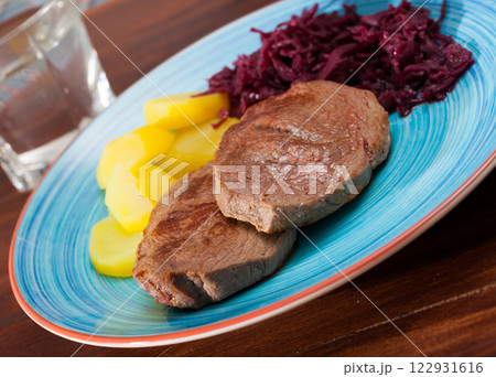 Veal steak with potato and sauerkraut 122931616
