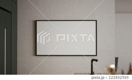 A minimalist, blank framed picture hangs on a textured wall, creating an elegant and modern aesthetic in the room. 3d rendering. A minimalist, blank framed picture hangs on a textured wall, creating an elegant and modern aesthetic in the room. 3d rendering. 122932593