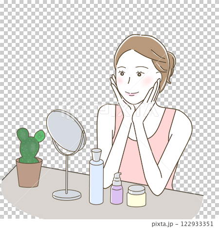 A woman happily doing skin care while looking at the mirror A woman happily doing skin care while looking at the mirror 122933351