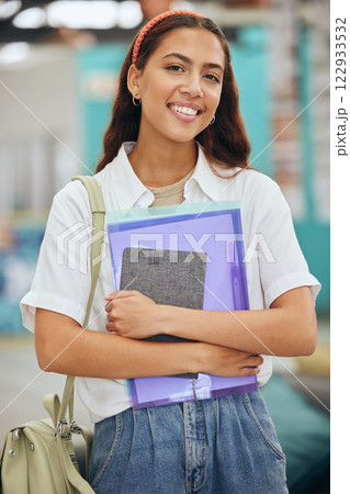 Woman portrait, college student and university campus in learning, school studying or higher education in Colombia. Happy young gen z girl standing with books, motivation and proud academic knowledge 122933532