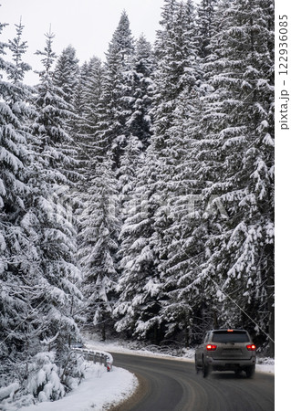 Car on Snowy Mountain Road Car on Snowy Mountain Road 122936085
