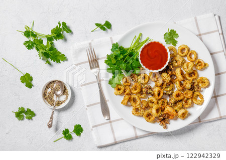 deep fried battered baby squid rings and tentacles 122942329