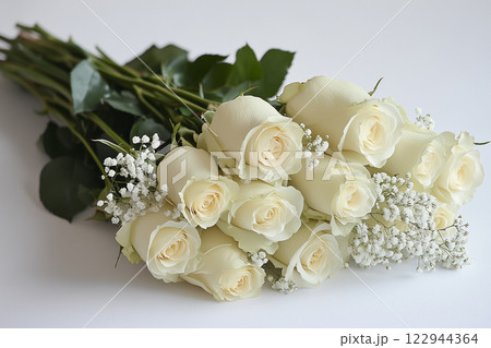 Elegant Close-Up of White Roses and Baby's Breath Wedding Bouquet 122944364