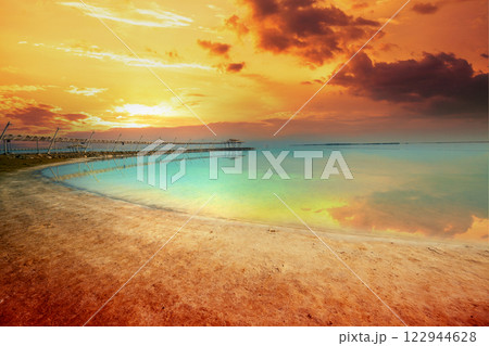 Texture of Dead Sea. Seascape with beautiful sky. Salty sea shore. Israel Texture of Dead Sea. Seascape with beautiful sky. Salty sea shore. Israel 122944628