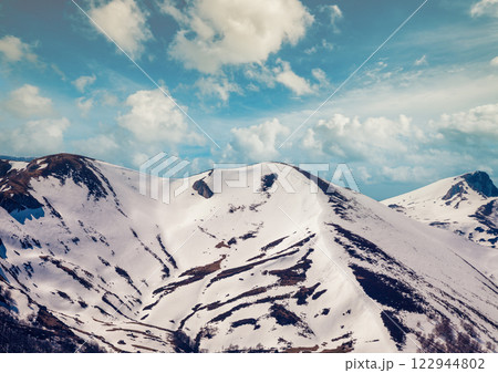 View of the Alps on a sunny day. The tops of the mountains are covered with snow. Triglav national park. Slovenia, Europe 122944802