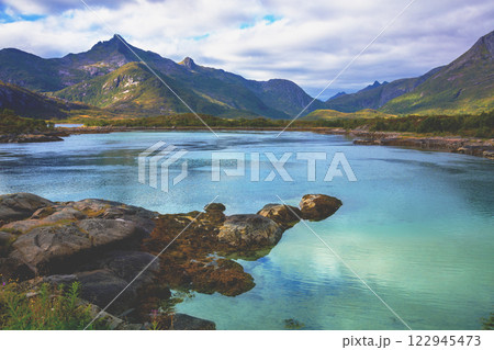 Mountain landscape in the daylight. View of the fjord. Beautiful nature of Norway 122945473