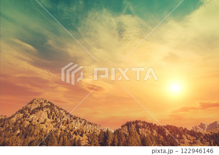 Mountain ridge against sunset sky Mountain ridge against sunset sky 122946146