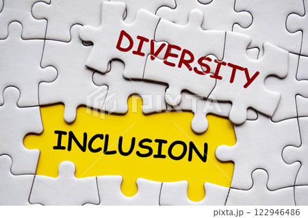 Diversity and Inclusion text on jigsaw puzzle. D and I concept Diversity and Inclusion text on jigsaw puzzle. D and I concept 122946486