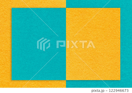 Texture yellow and turquoise paper background with geometric shape, macro. Structure craft cerulean cardboard Texture yellow and turquoise paper background with geometric shape, macro. Structure craft cerulean cardboard 122946673