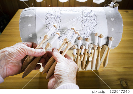 Bobbin lace Bobbin lace 122947240