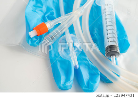 Foley catheter and urine drainage bag collect urine for disability or patient in hospital. 122947431