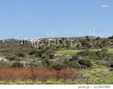 Wind turbines in a scenic landscape. Renewable energy sources, using wind to generate electricity. 122947966