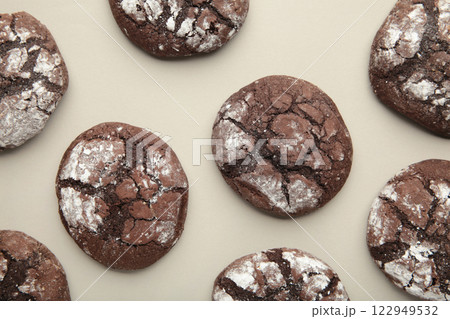 Soft dark chocolate brownie cookies on grey background. Soft dark chocolate brownie cookies on grey background. 122949532