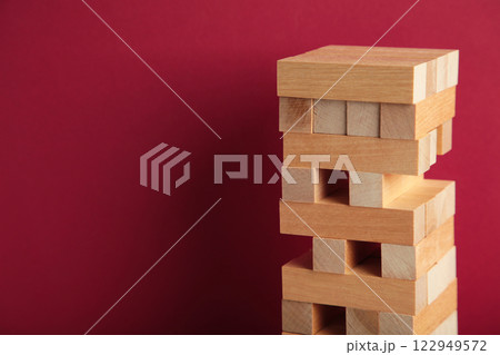 Blocks of wood on red background, Strategy game as a business plan for team work Blocks of wood on red background, Strategy game as a business plan for team work 122949572