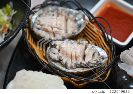 Korean seafood dish. Abalone sashimi 122949626