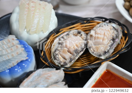 Korean seafood dish. Abalone sashimi 122949632