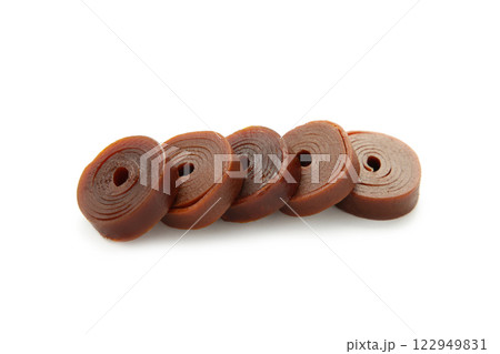 Fruit pastille isolated on a white background. Fruit roll-ups made from raspberry, apples and currant. 122949831