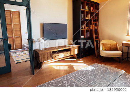 Close-up details of an elegant armchair made of orange fabric and wooden elements 122950002