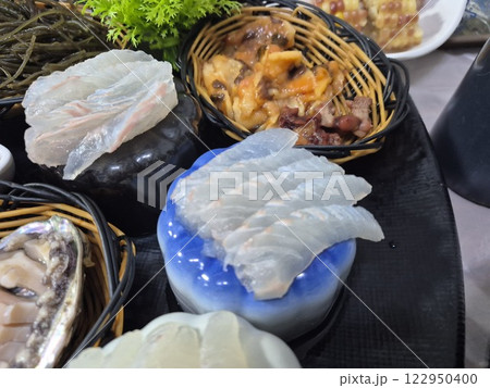 Korean seafood dish. raw fish Sashimi Korean seafood dish. raw fish Sashimi 122950400