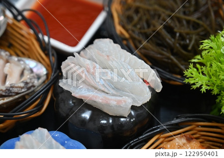 Korean seafood dish. raw fish Sashimi 122950401