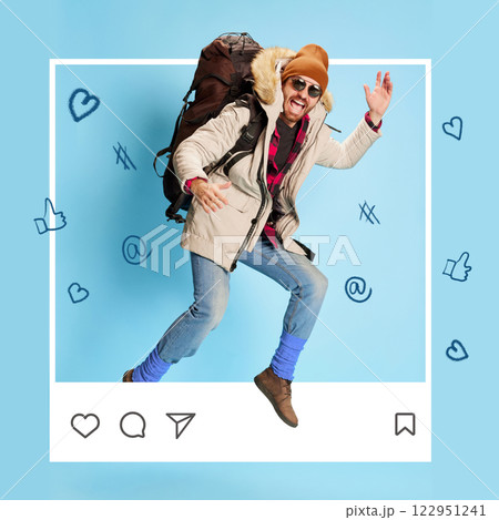 Contemporary art collage. Male traveler with backpack jumping excitedly against blue background decorated with digital symbols. 122951241
