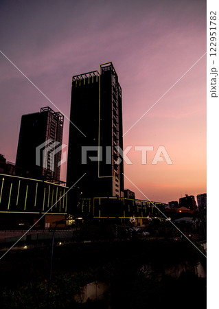 Bitexco and Landmark 81 at Sunset in Ho Chi Minh City with Saigon Bridge and Scenic View 122951782