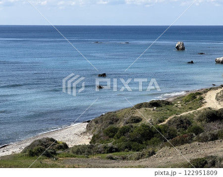 Scenic beach and rock formations in Cyprus. Mediterranean Sea, road, travel, view of mountains and sea. Scenic beach and rock formations in Cyprus. Mediterranean Sea, road, travel, view of mountains and sea. 122951809