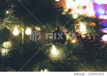 Christmas Tree with Book and Nativity Scene Festive Holiday Decorations and Cozy Seasonal Atmosphere. High quality photo 122951915