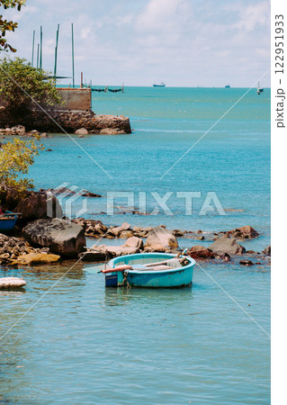 Vung Tau Beach with Blue Sky Flowers and Mother Mary Statue Scenic Coastal View with Coffee Shop Nearby High quality photo Vung Tau Beach with Blue Sky Flowers and Mother Mary Statue Scenic Coastal View with Coffee Shop Nearby High quality photo 122951933