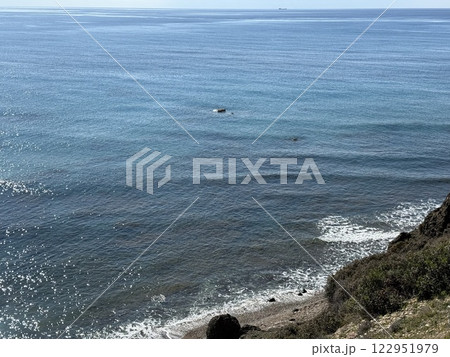 Scenic beach and rock formations in Cyprus. Mediterranean Sea, road, travel, view of mountains and sea. 122951979