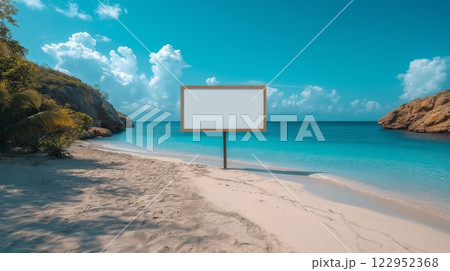 Blank wooden empty signboard mockup on sandy beach with ocean in background 122952368