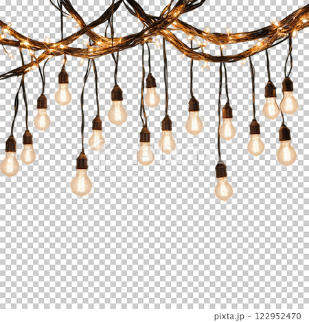 Decorative warm lights hanging in a creative arrangement for evening outdoor ambiance 122952470
