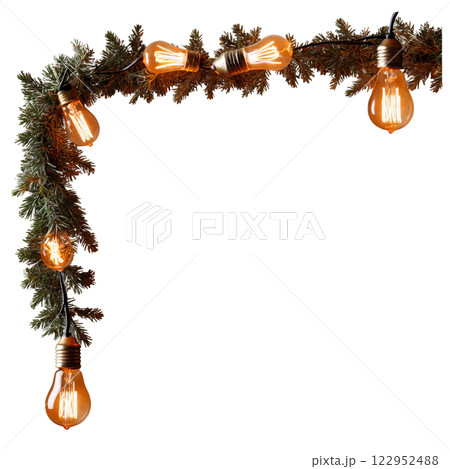 Garland decorated with warm, glowing lights during a cozy evening gathering in winter 122952488