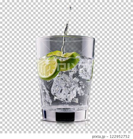 Refreshing glass of water with lime and ice captured in bright lighting 122952752