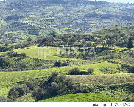 Scenic view of lush green landscape. Spring time, beautiful view of the mountainous area. 122953267