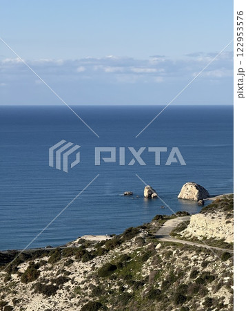 Scenic beach and rock formations in Cyprus. Mediterranean Sea, road, travel, view of mountains and sea. 122953576