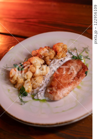 Baked turkey and cauliflower are a delicious dish 122956109