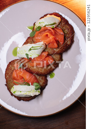 golden, crispy draniki, freshly cooked in the 122956241