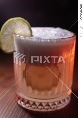 A beautiful bright cocktail. Restaurant, a glass 122956286