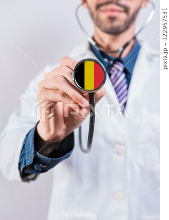 Belgium health and medical insurance concept. Belgium Healthcare System, doctor holding stethoscope Belgium health and medical insurance concept. Belgium Healthcare System, doctor holding stethoscope 122957531