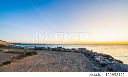 Christies Beach coastline with Witton Bluff trail at dusk 122958121
