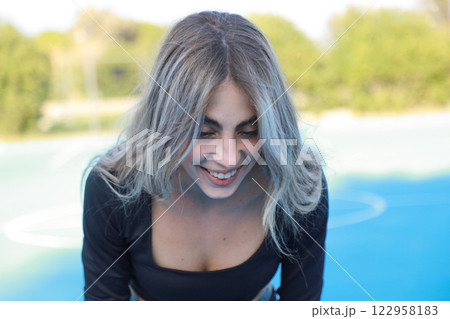 Something Makes The Young Woman Laugh Something Makes The Young Woman Laugh 122958183
