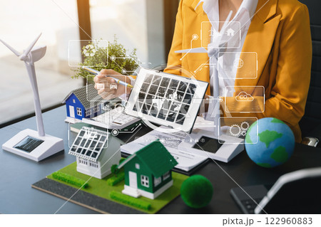 business planning and discussing on recycle reduce reuse policy symbol in office meeting room. Green business company and Solar Energy business planning and discussing on recycle reduce reuse policy symbol in office meeting room. Green business company and Solar Energy 122960883